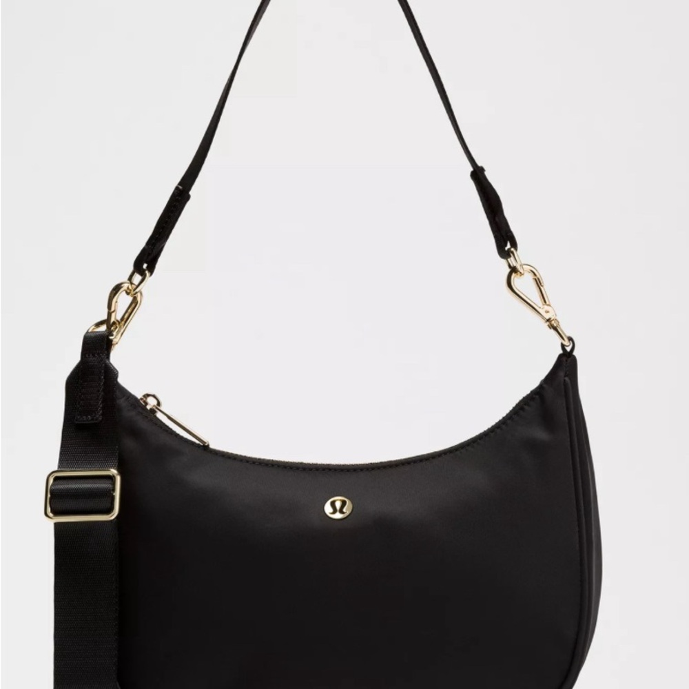 Lululemon Athletica Black Shoulder Bag with Gold Accents